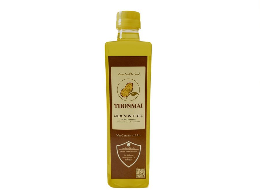 Thonmai wood-pressed groundnut oil bottle
